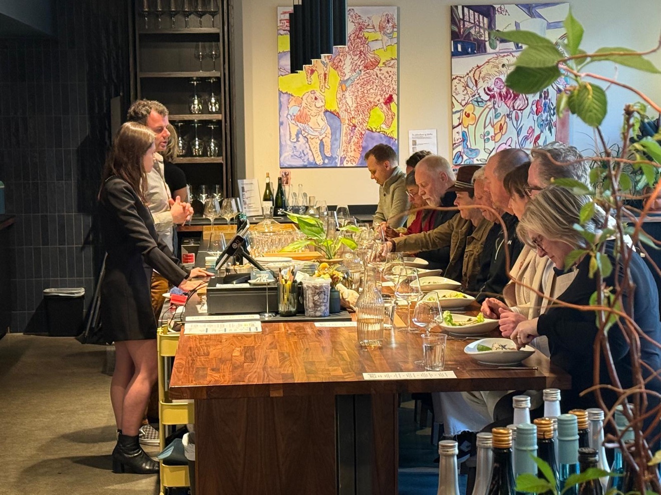 Hosting a room of seated dinner guests at the Maison V Sake Dinner in Seattle